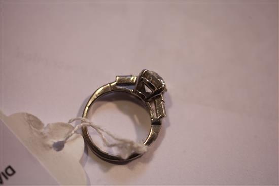 A 20th century platinum and single stone diamond ring, size K.